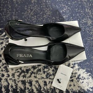 Prada open side heels. 2” heels. Prada shoe bags and new heel replacements.